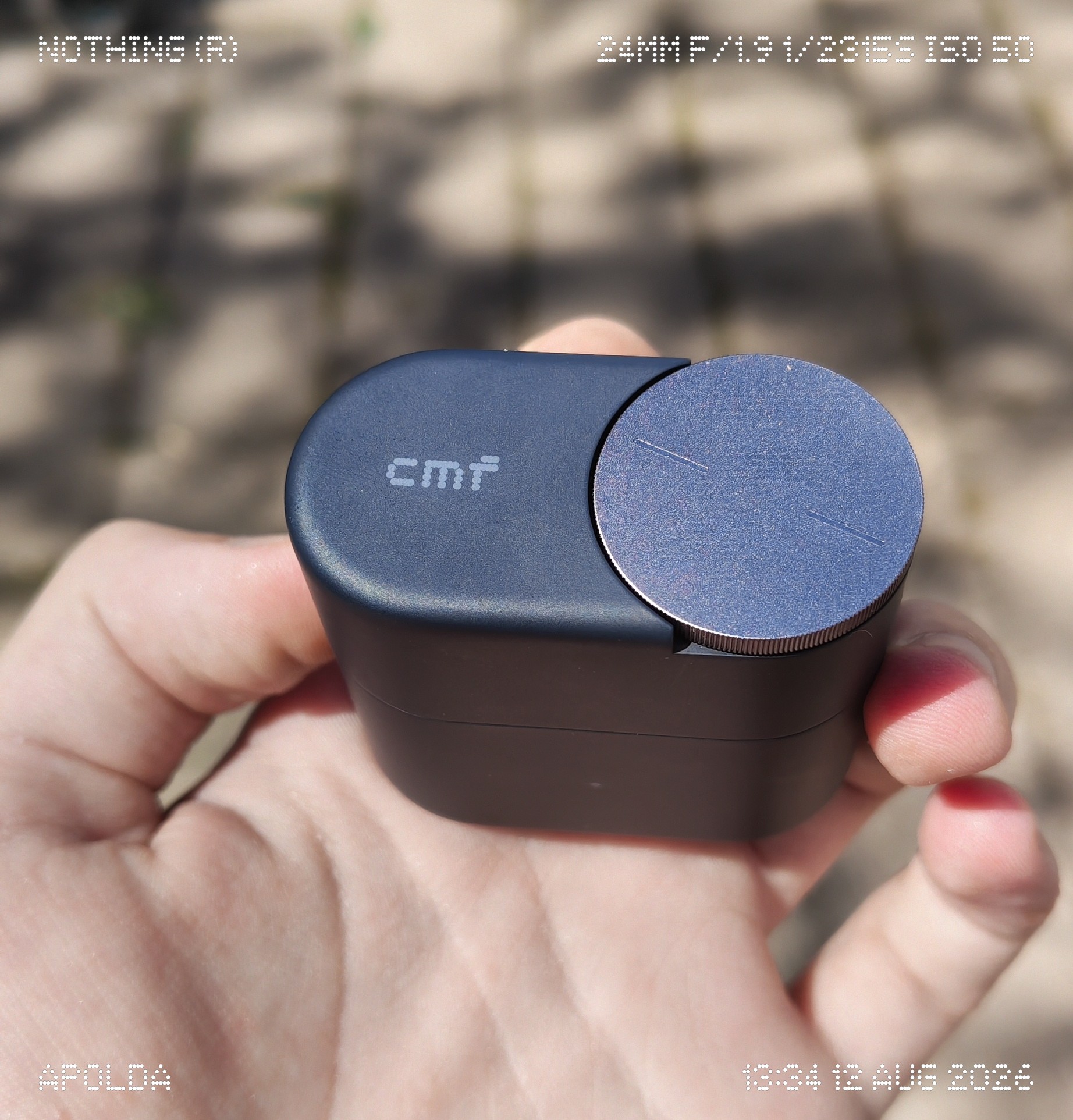 The charging case featuring the Smart Dial